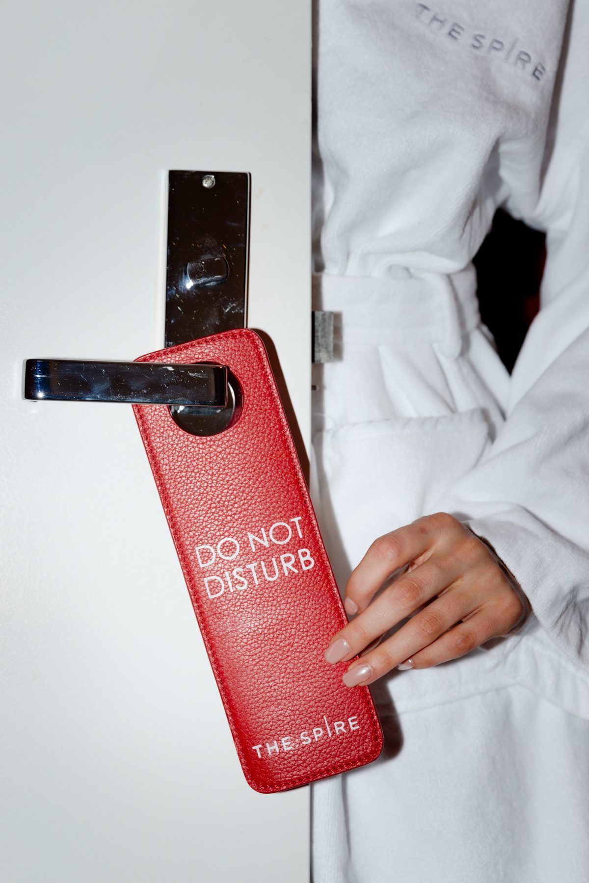 Photo: Natasha Ruiz Do Not Disturb sign and Spire robe